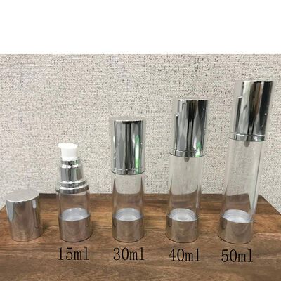 कॉस्मेटिक पैकेजिंग के लिए स्टॉक खाली 15ml 30ml 40ml 50ml स्क्रू लॉक पंप प्लास्टिक एयरलेस लोशन पंप बोतल सिल्वर कैप