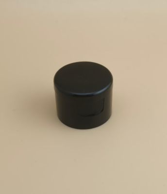 कॉस्मेटिक बोतलों के लिए काले प्लास्टिक गोल चिकनी टोपी