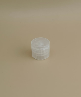 कॉस्मेटिक बोतलों के लिए छोटे पारदर्शी गोल रिब्ड प्लास्टिक कैप